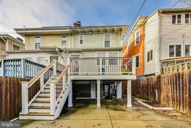 a view of a house with wooden stairs