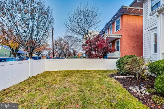 a view of swimming pool with an outdoor seating