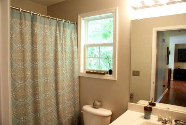 2023 Clara Mathis Road Spring Hill, TN 37174 - Photo 13 of 16 a bathroom with a sink and a mirror
