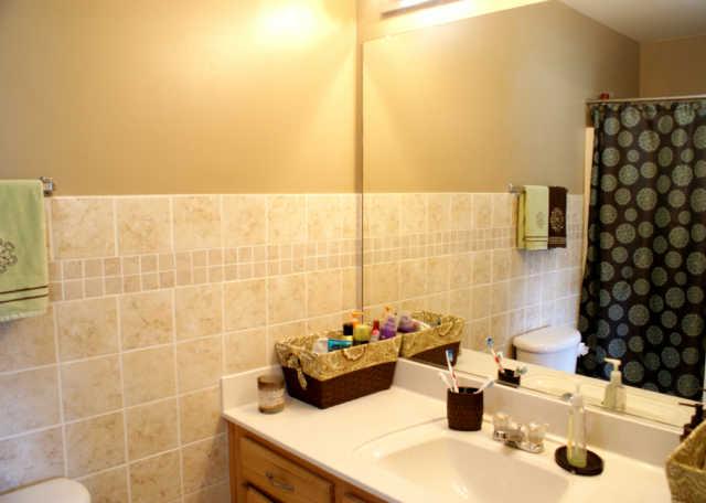2023 Clara Mathis Road Spring Hill, TN 37174 - Photo 9 of 16 a bathroom with a sink and a shower