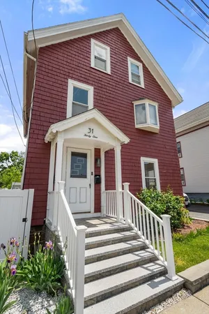 a front view of a house with a porch