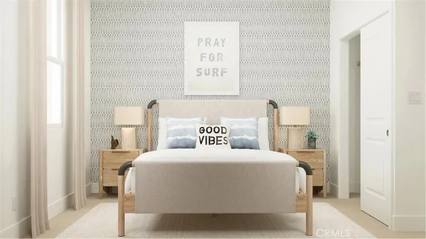 a bedroom with a bed and a painting on the wall