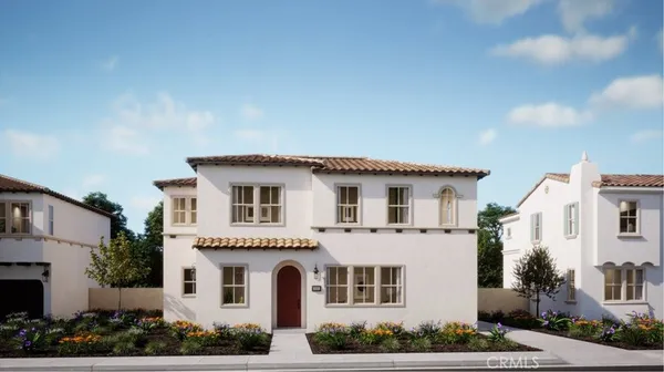 a view of white house with a white fence