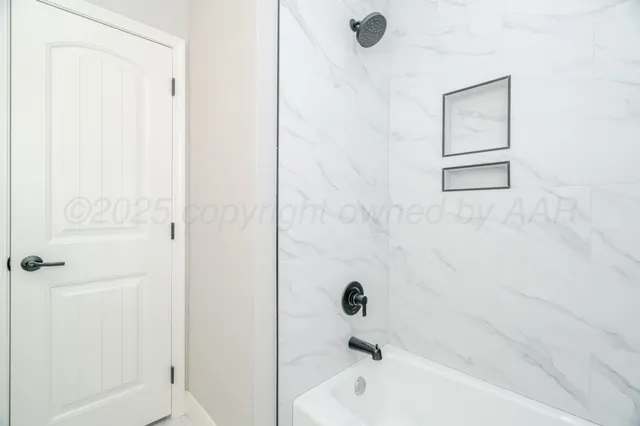 a bathroom with a bathtub