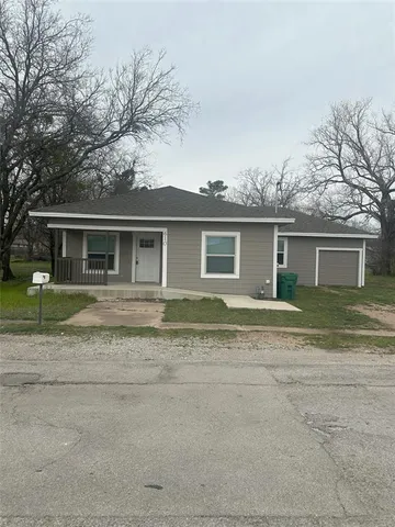 front view of house with a yard