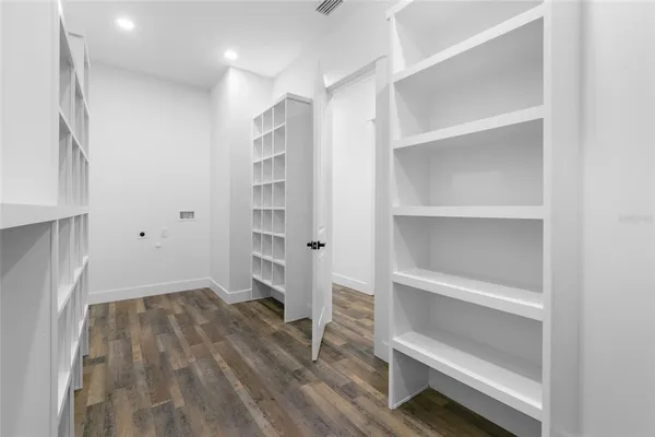 a view of a room with shelves