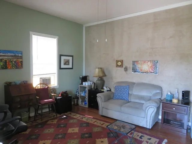 a living room with furniture and a couch