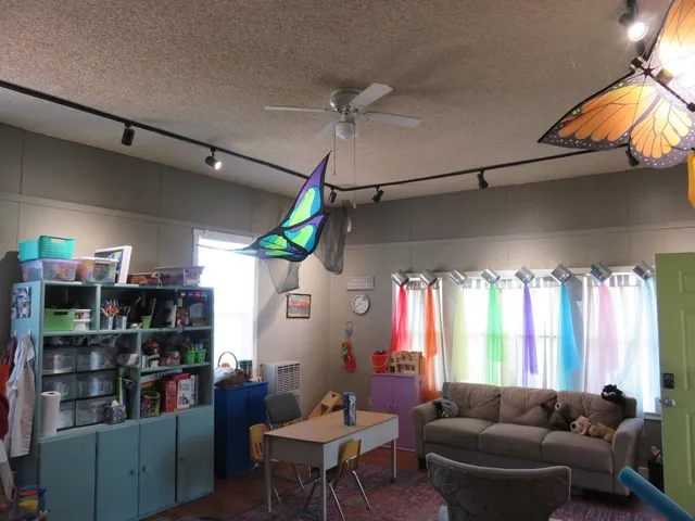 a white toilet sitting next to a bathroom sink and tub