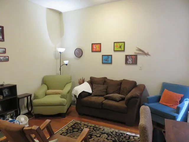 a view of a dining room with furniture