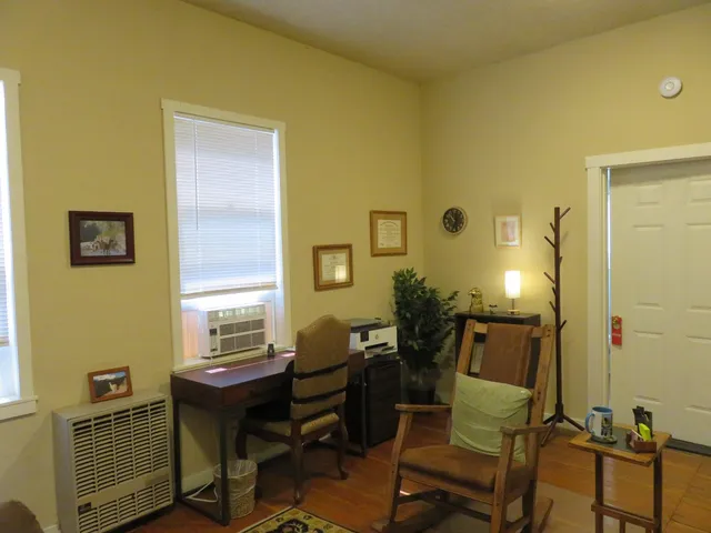 a kitchen with a sink stainless steel appliances and cabinets