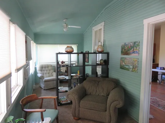 a bedroom with a bed and furniture