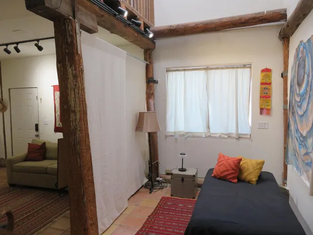 a bathroom with a bathtub and a window