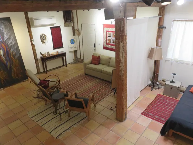 a view of a road with a bench in the background