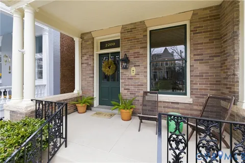 a kitchen with stainless steel appliances granite countertop a sink refrigerator and microwave