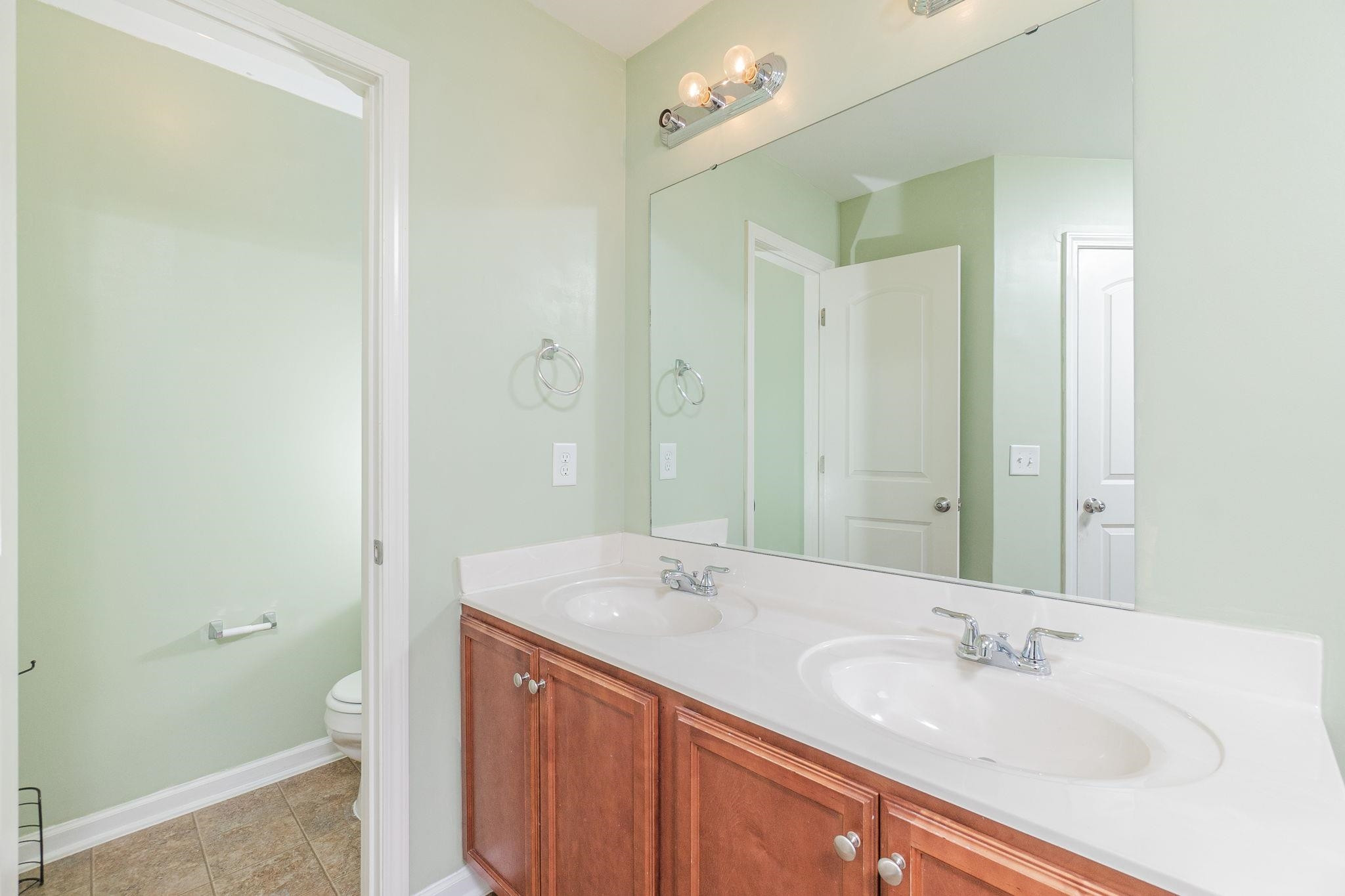 4816 Quarryman Road Raleigh, NC 27610 - Photo 16 of 25 Luxury owners bath with separate tub and shower Owners bath