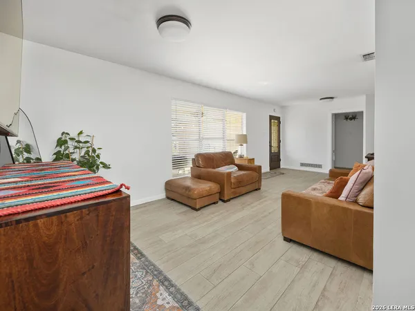 a living room with furniture and a couch