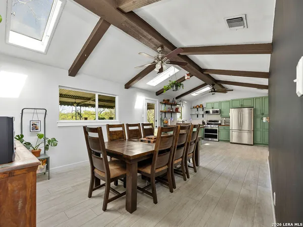 a view of a dining room with furniture