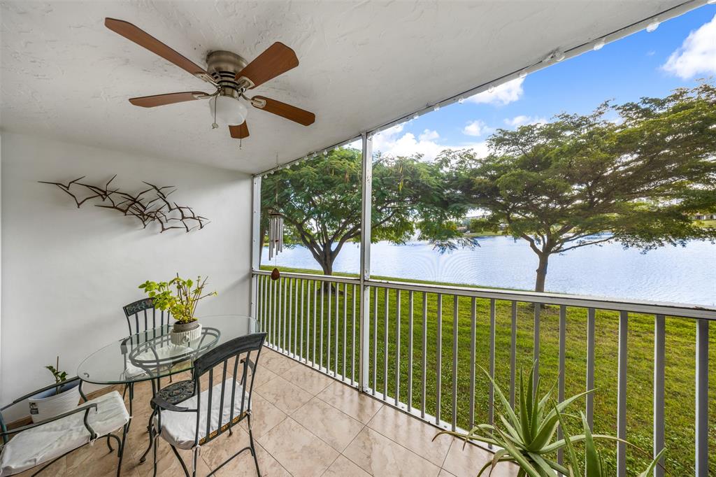 3150 North Course Lane, Unit 203 Pompano Beach, FL 33069 - Photo 18 of 26 a view of a balcony with furniture