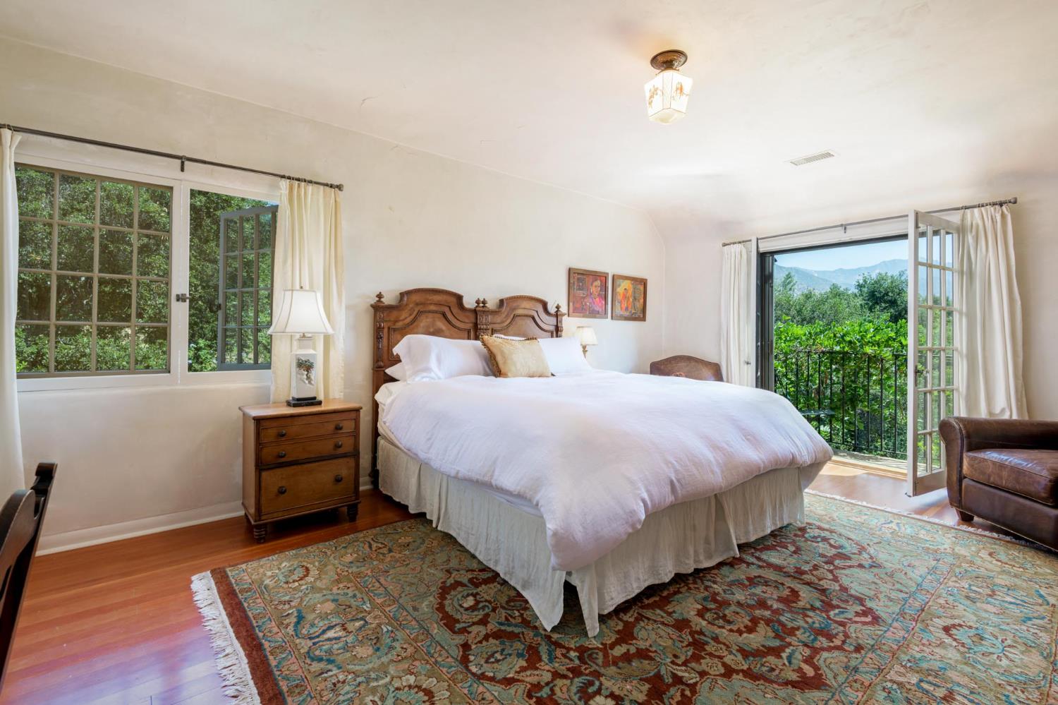 520 Foothill Road Ojai, CA 93023 - Photo 31 of 45 a bed room with a bed and a chair