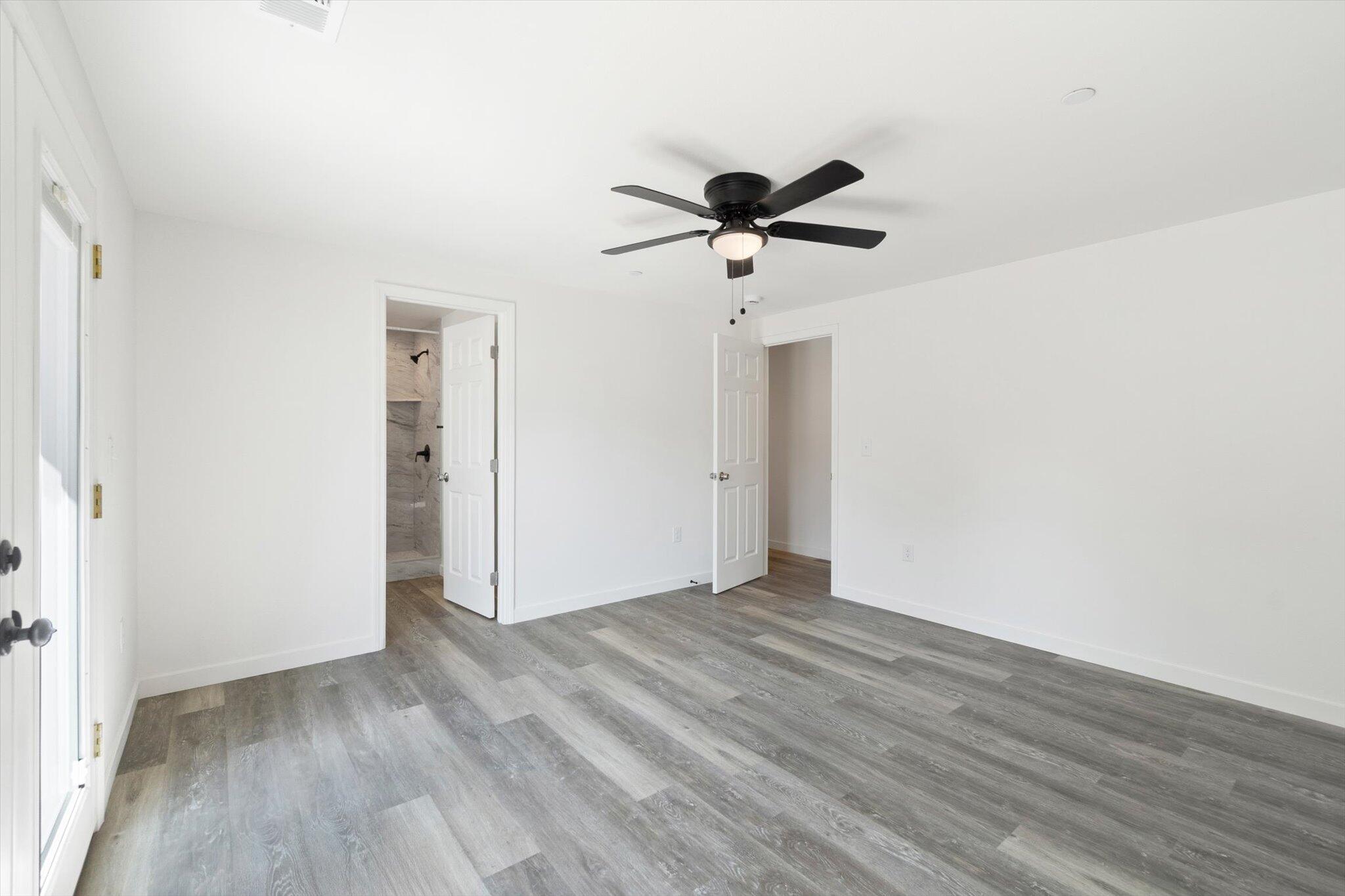 3276 School Street Redding, CA 96002 - Photo 11 of 36 a view of empty room with wooden floor