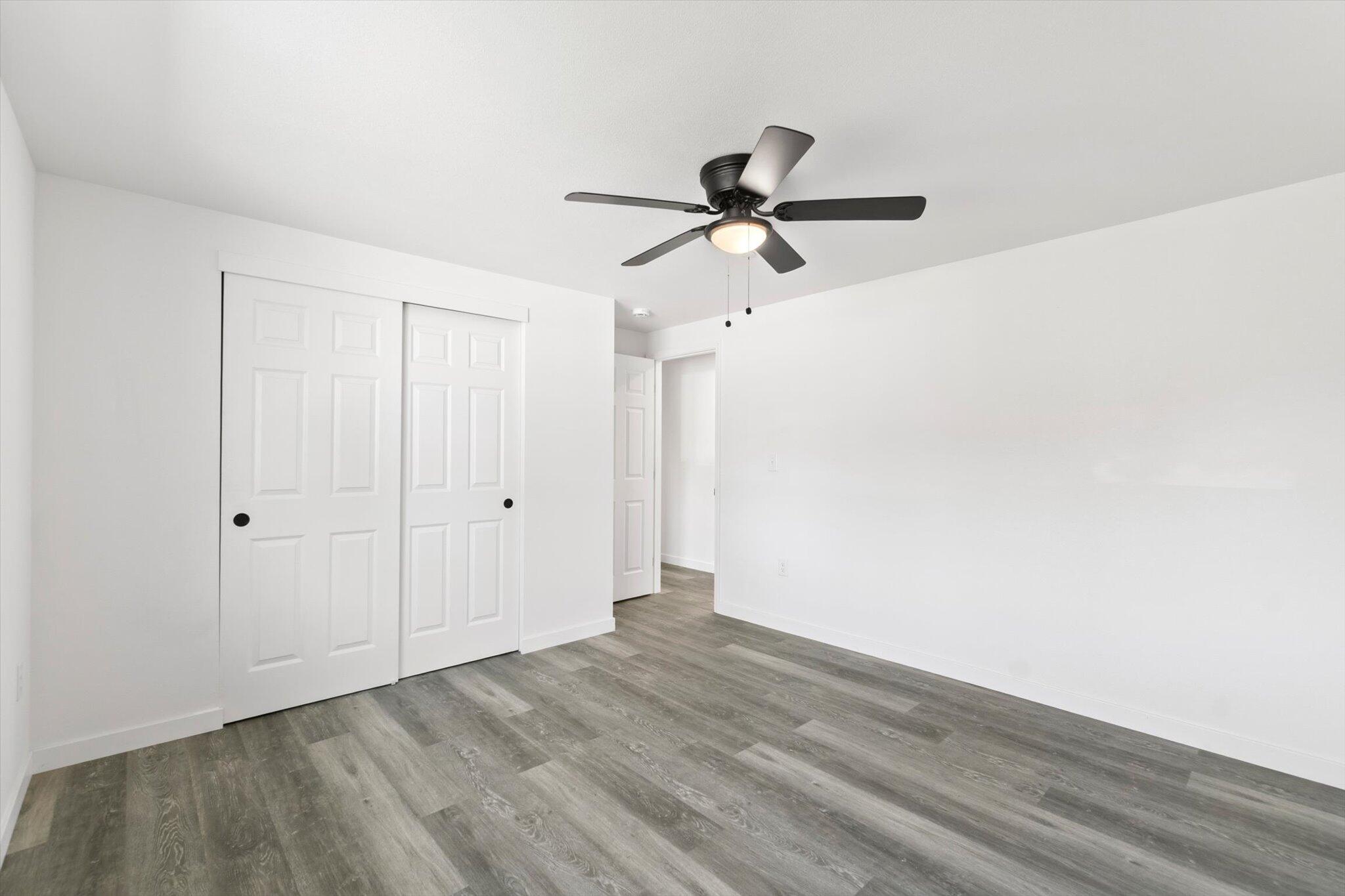 3276 School Street Redding, CA 96002 - Photo 16 of 36 a view of empty room with wooden floor