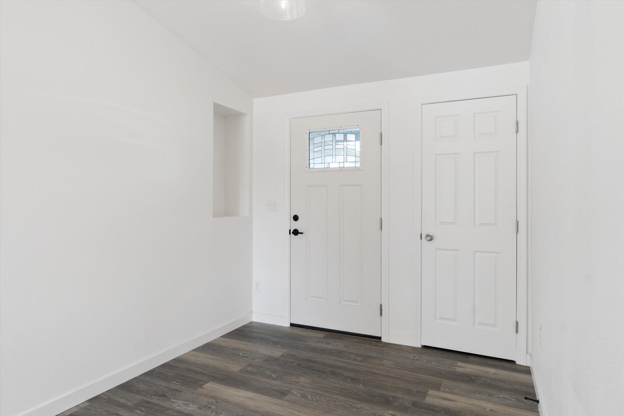 3276 School Street Redding, CA 96002 - Photo 18 of 36 a view of an empty room with wooden floor