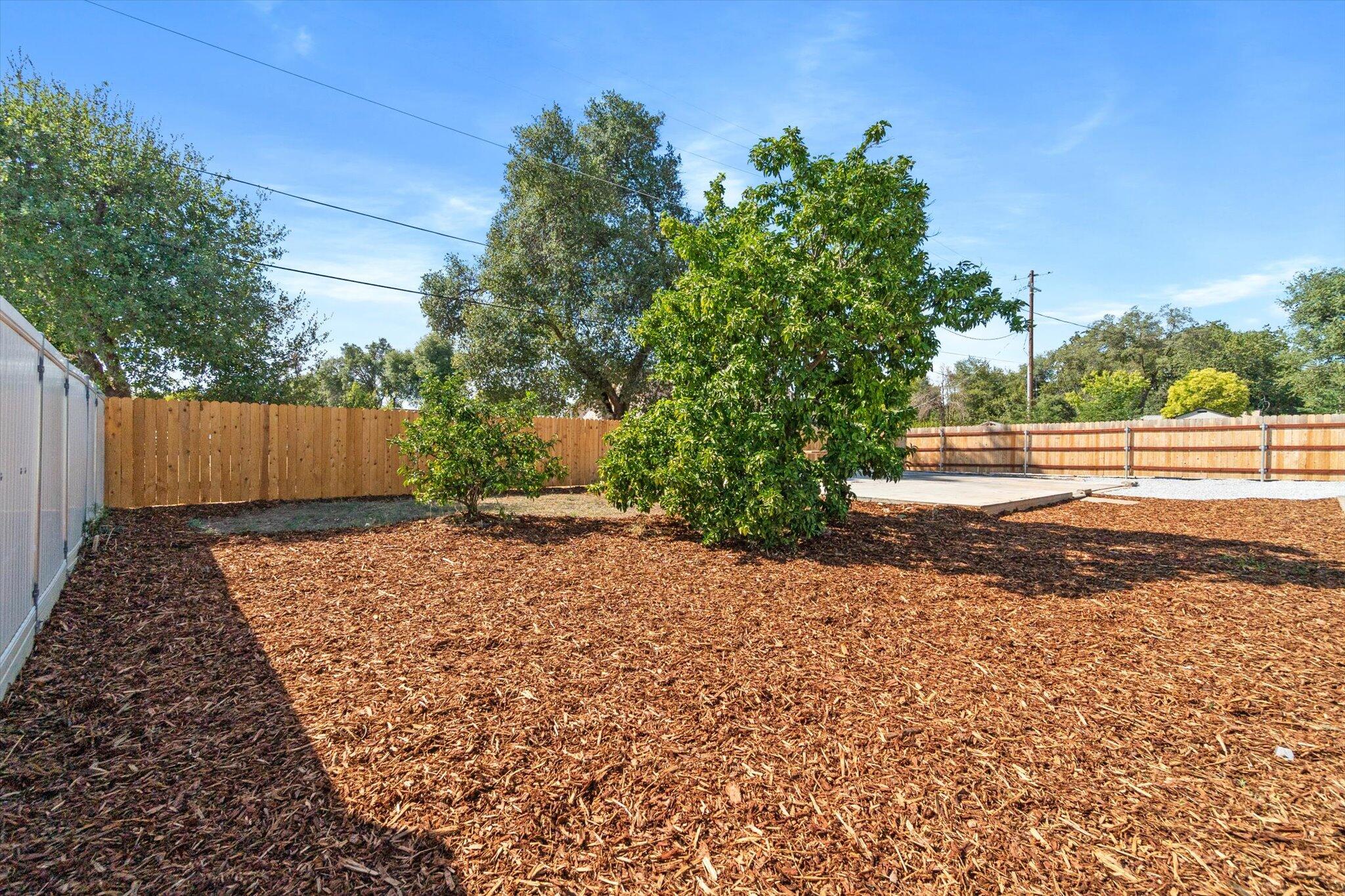 3276 School Street Redding, CA 96002 - Photo 23 of 36 a view of backyard with green space