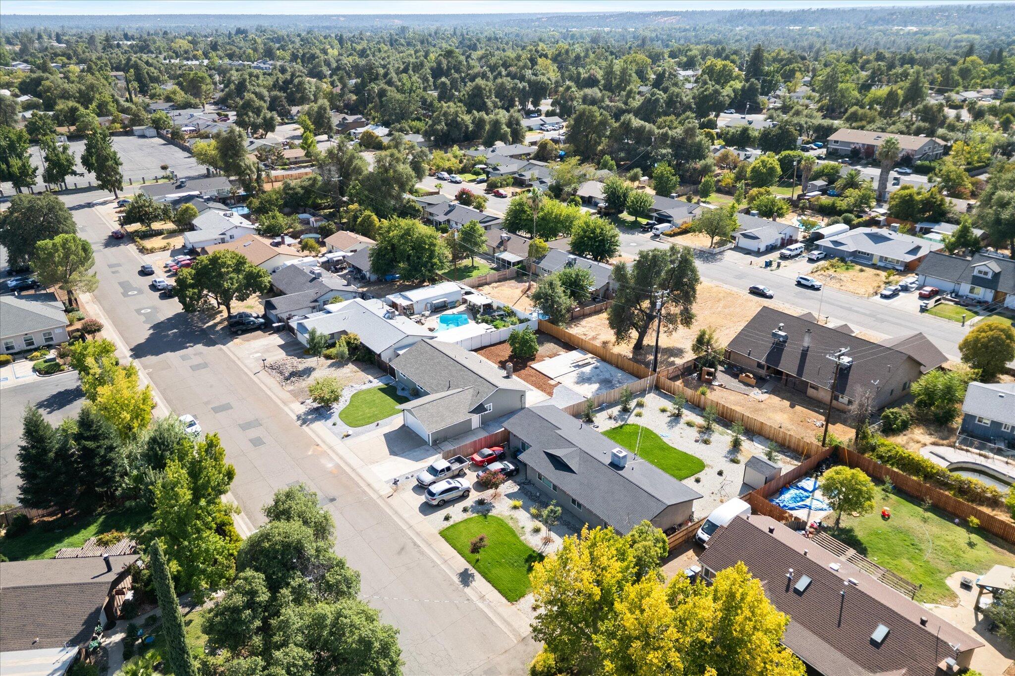 3276 School Street Redding, CA 96002 - Photo 33 of 36 an aerial view of residential houses with outdoor space
