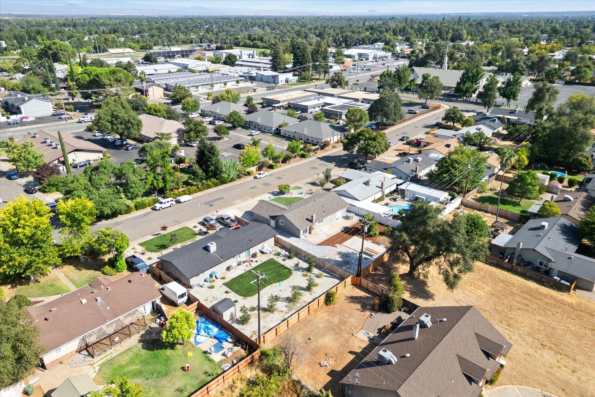3276 School Street Redding, CA 96002 - Photo 34 of 36 an aerial view of residential houses with outdoor space