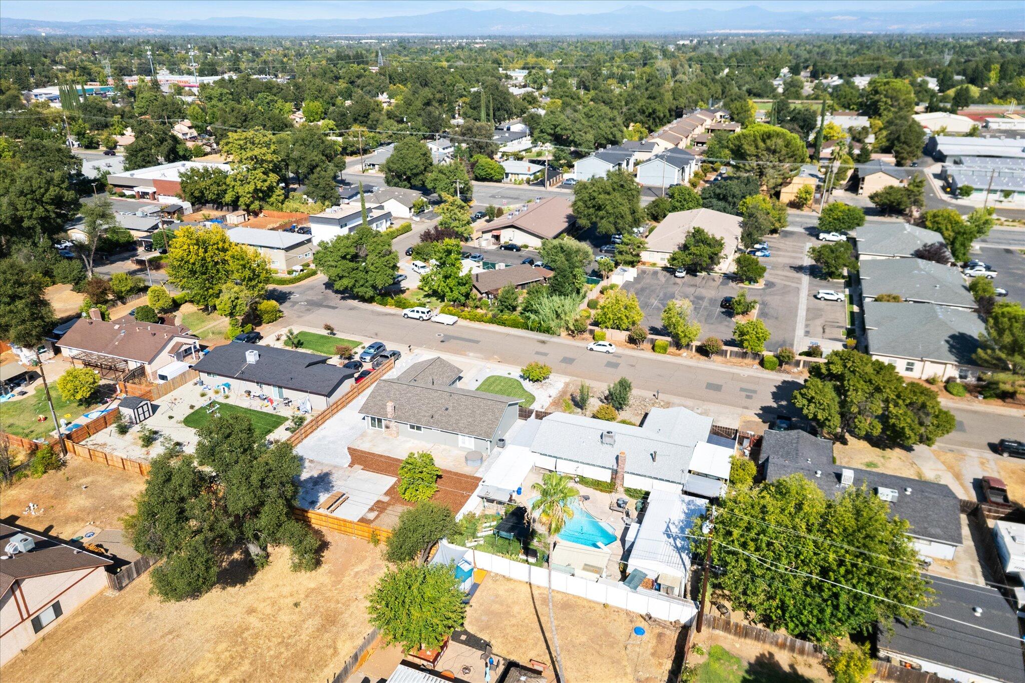 3276 School Street Redding, CA 96002 - Photo 35 of 36 an aerial view of residential houses with outdoor space