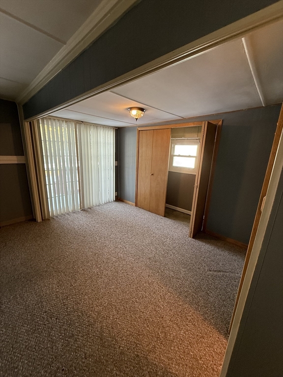 4 Center Street Brimfield, MA 01010 - Photo 5 of 16 a view of a livingroom with an empty space and a balcony