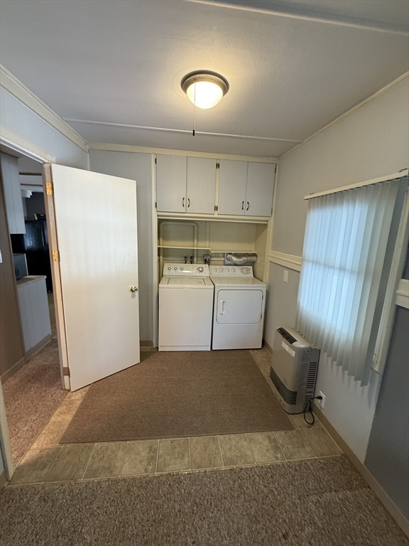 4 Center Street Brimfield, MA 01010 - Photo 6 of 16 a view of a kitchen with a sink and refrigerator