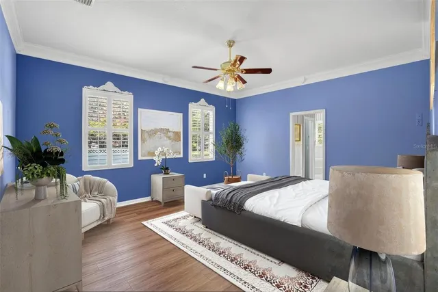 a white toilet sitting next to a shower