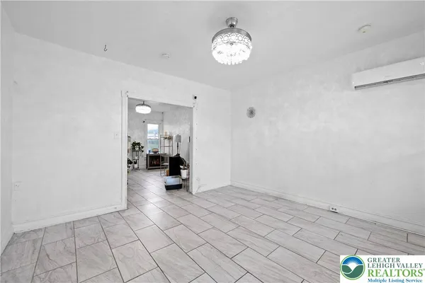 a view of a room & utility room