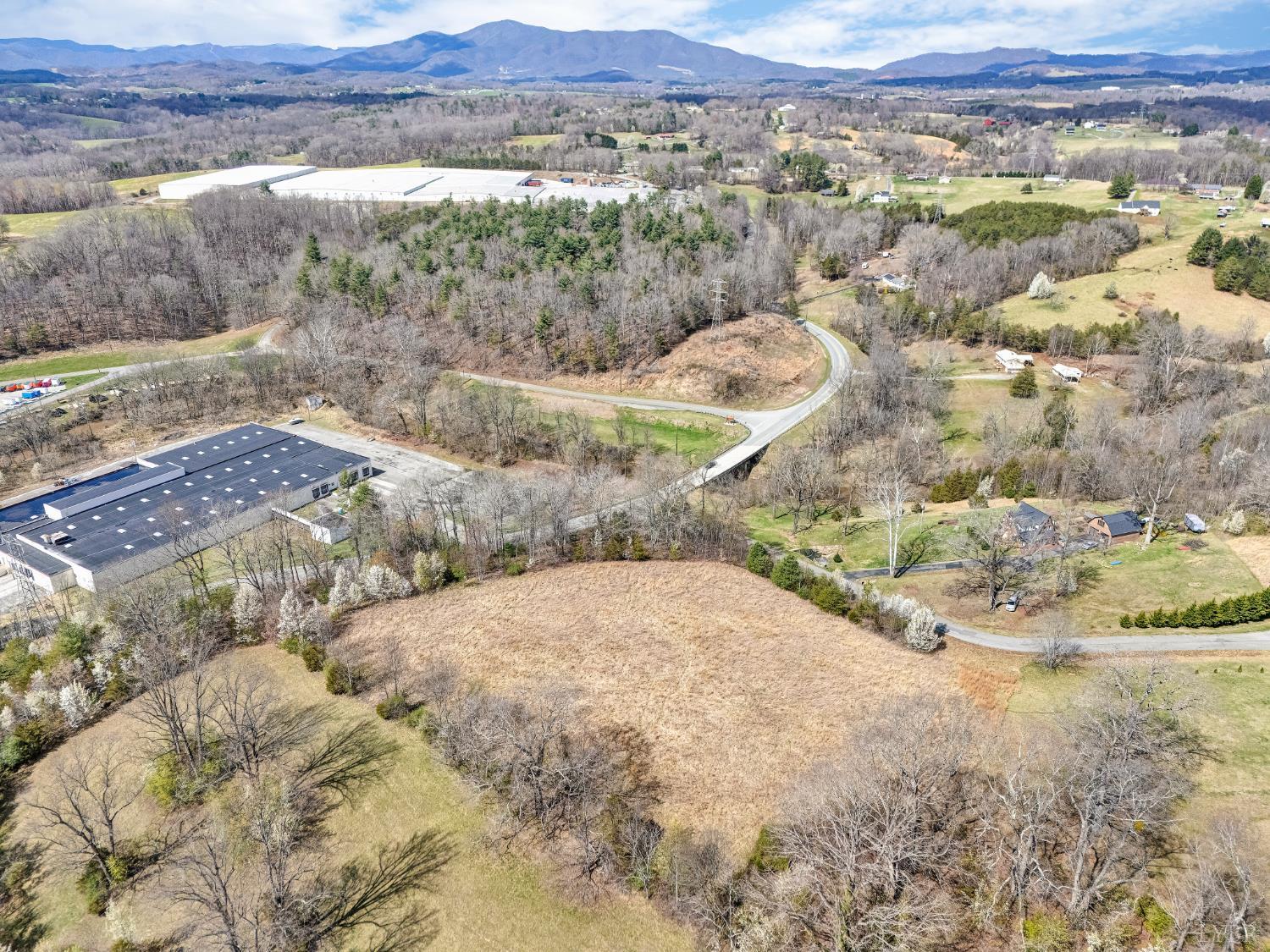 0 Springhouse Lane Rocky Mount, VA 24151 - Photo 3 of 14 a view of a backyard with mountain
