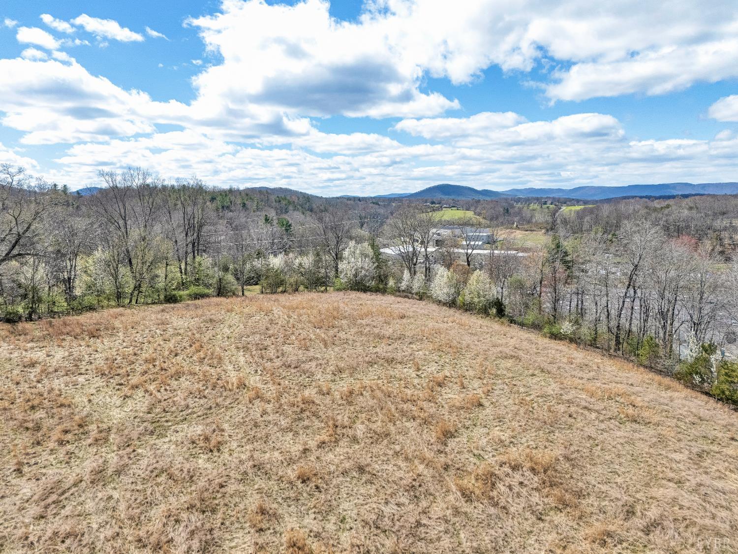 0 Springhouse Lane Rocky Mount, VA 24151 - Photo 10 of 14 a view of a dry yard with wooden fence