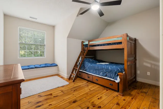 a bedroom with bunk bed