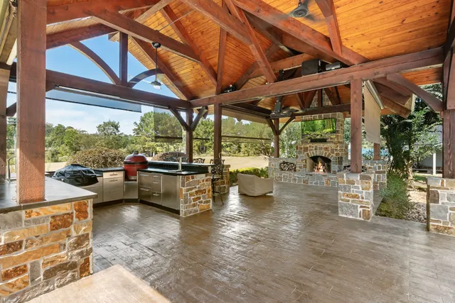 a view of a chairs and table in the patio