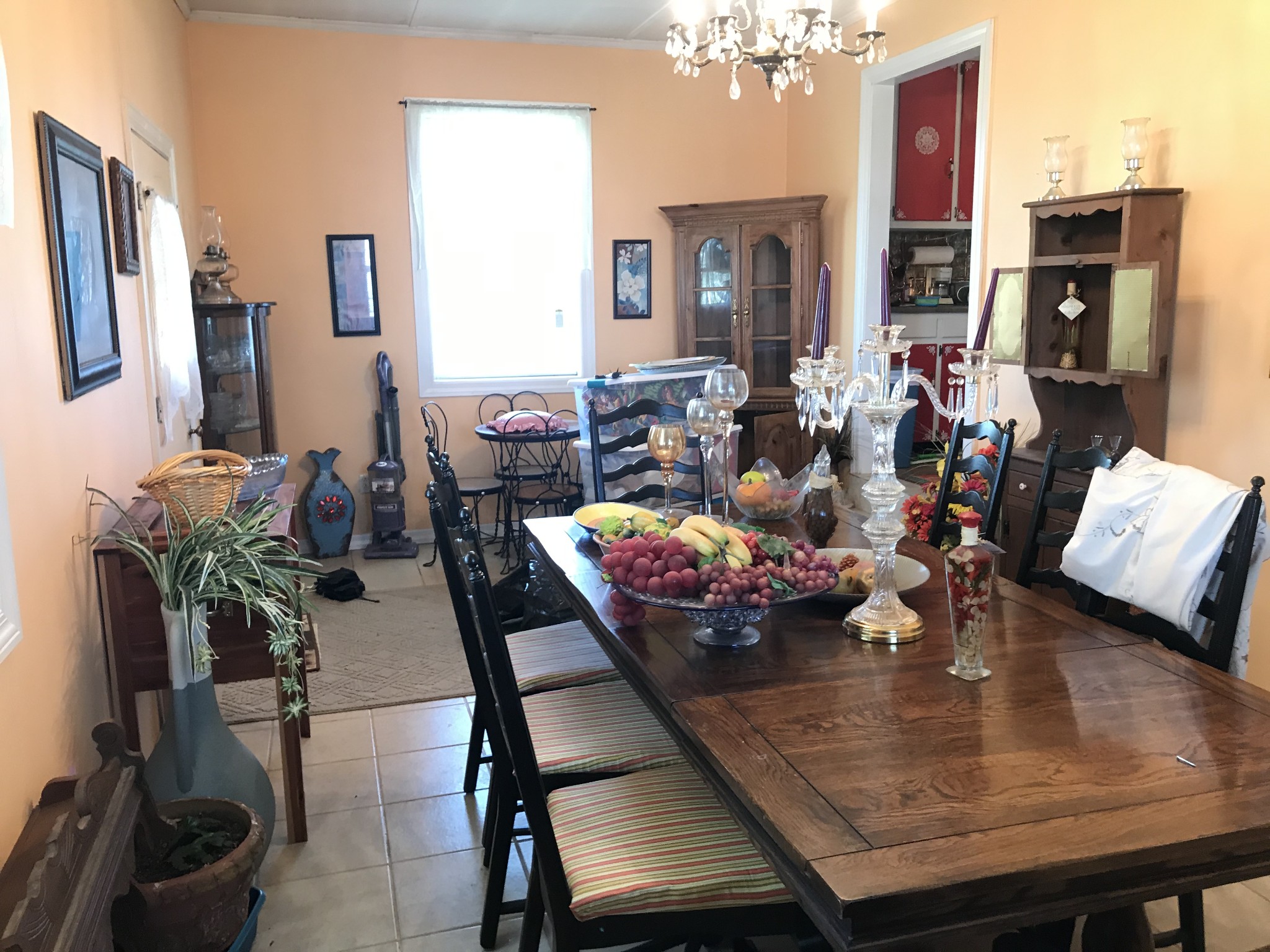 572 Rabbit Trail Road Leoma, TN 38468 - Photo 13 of 24 a view of a dining room with furniture and a chandelier