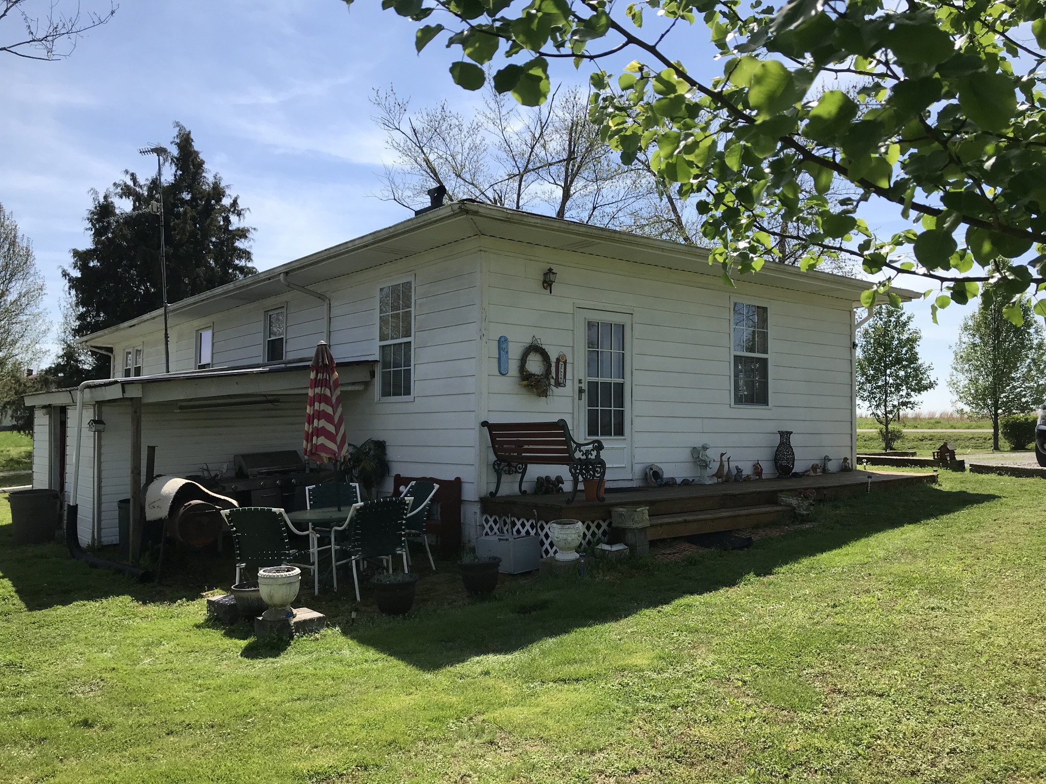 572 Rabbit Trail Road Leoma, TN 38468 - Photo 3 of 24 a front view of a house with a yard