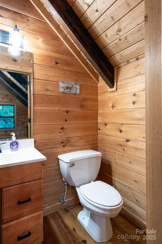 a bathroom with a toilet and a sink