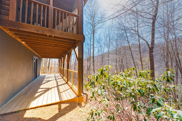 a view of a terrace with chairs and refrigerator