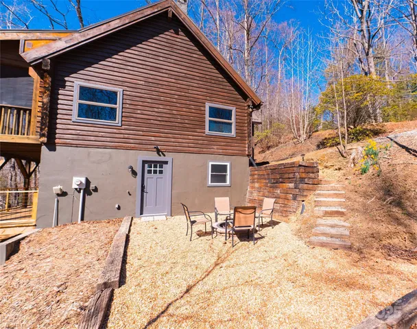 a view of a backyard of the house