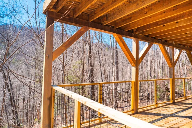 a view of a backyard with sitting area
