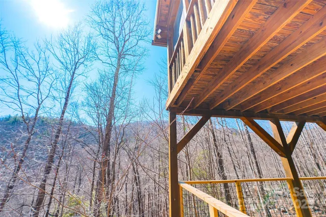 a view of a house with snow on the road
