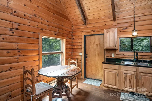 a outdoor space with granite countertop a sink and a couch