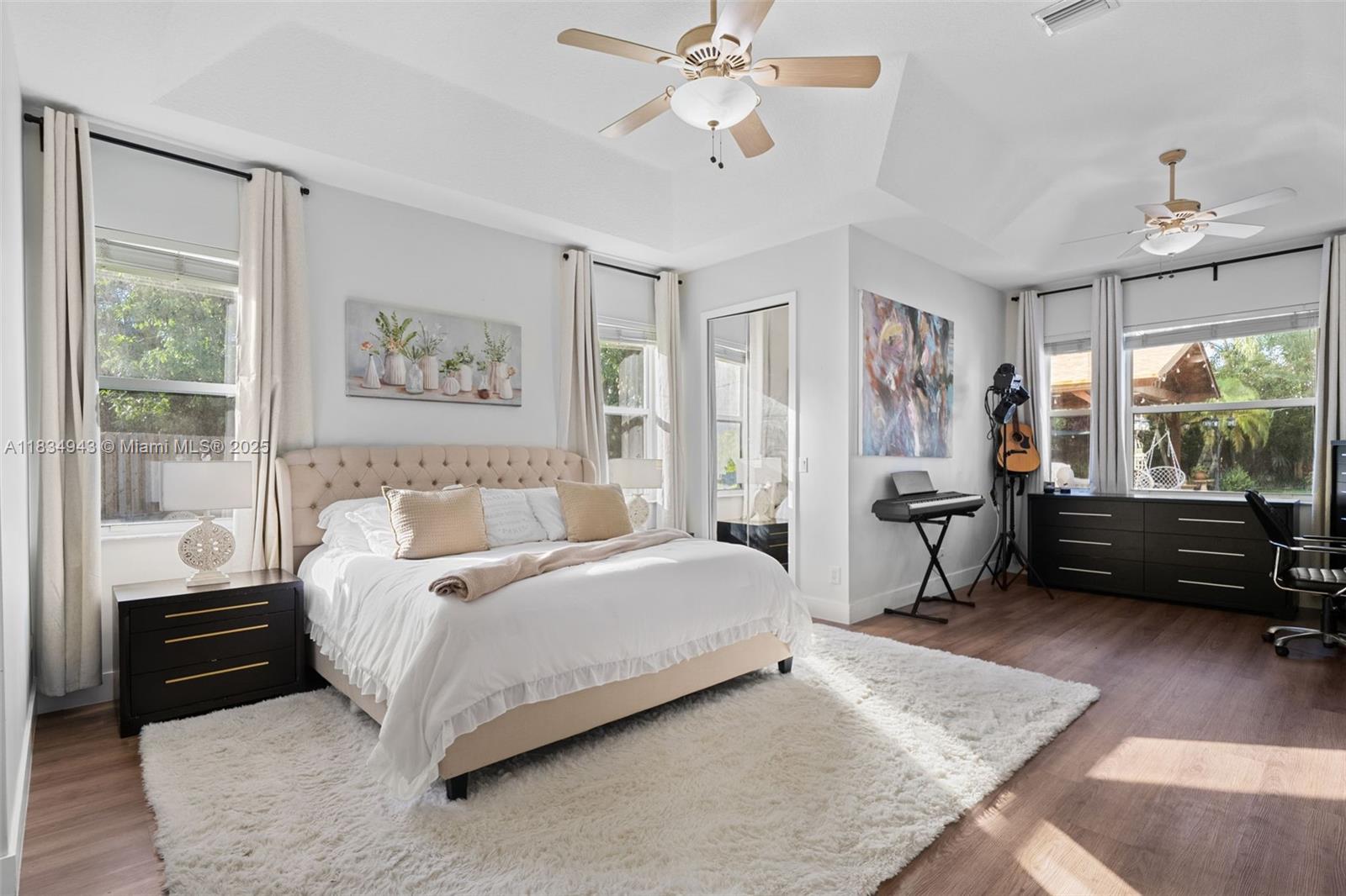 14501 Southwest 33rd Court Miramar, FL 33027 - Photo 30 of 91 a bedroom with a bed furniture and a window