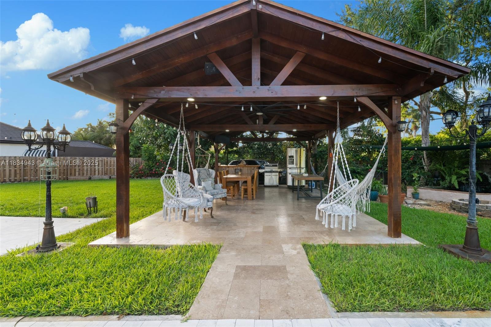 14501 Southwest 33rd Court Miramar, FL 33027 - Photo 47 of 91 a view of a backyard with sitting area
