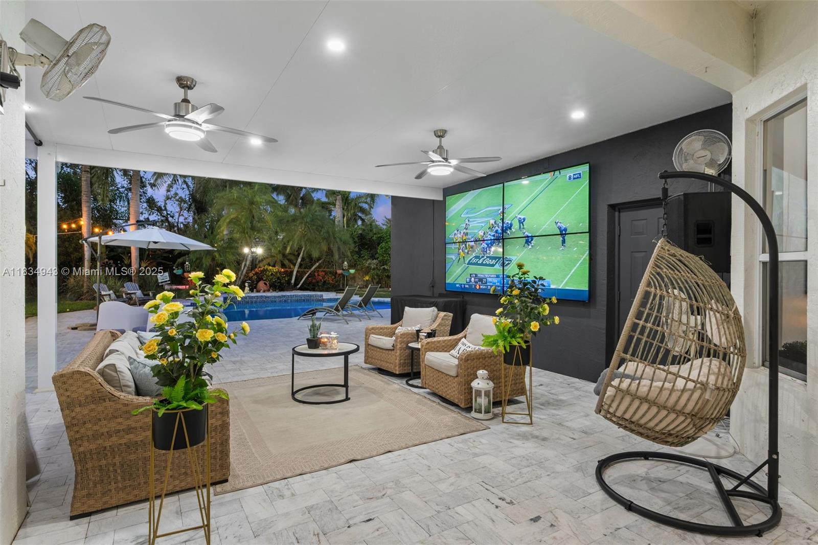 14501 Southwest 33rd Court Miramar, FL 33027 - Photo 64 of 91 a living room with furniture and a large window