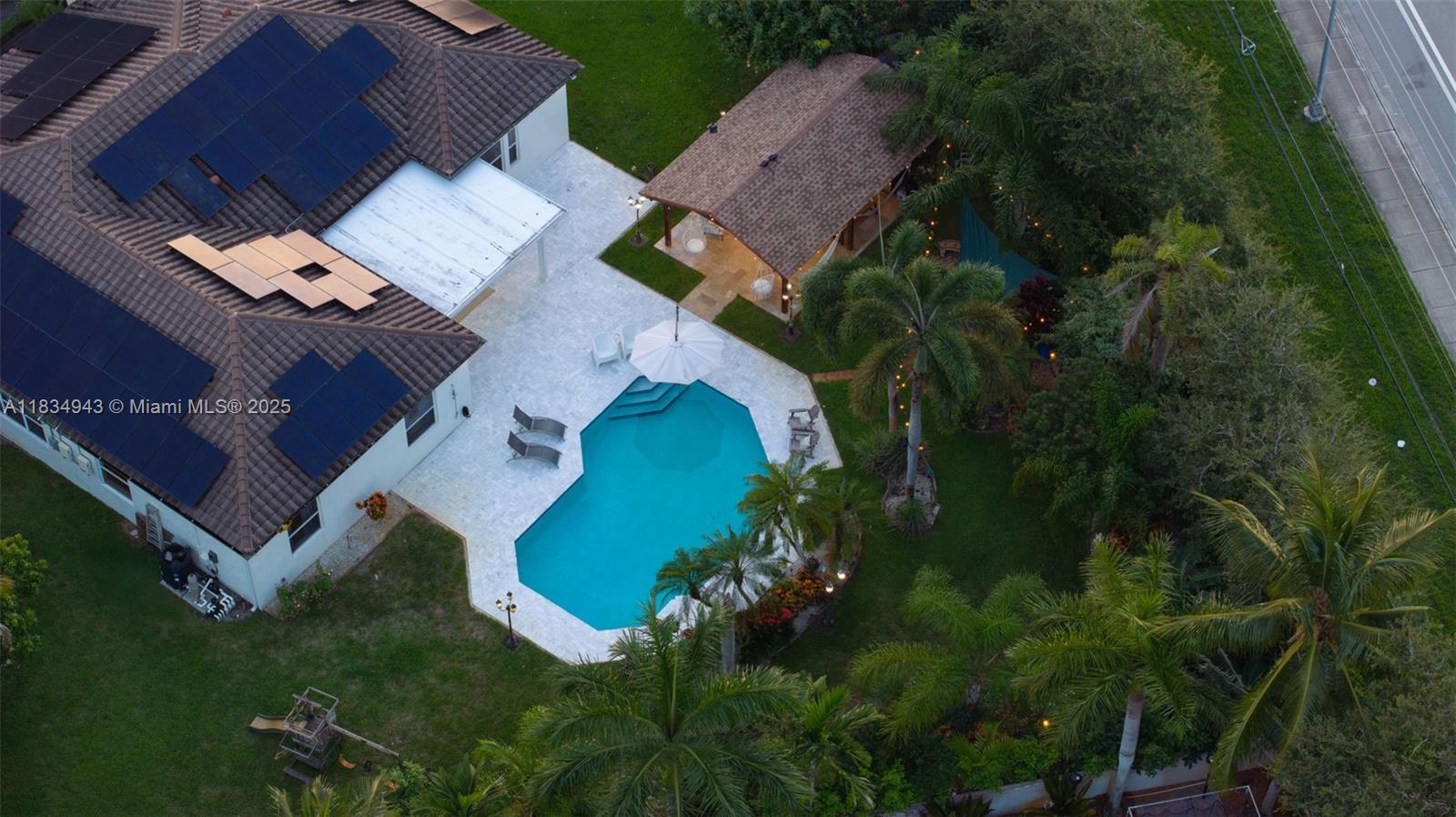 14501 Southwest 33rd Court Miramar, FL 33027 - Photo 81 of 91 an aerial view of a house with a garden